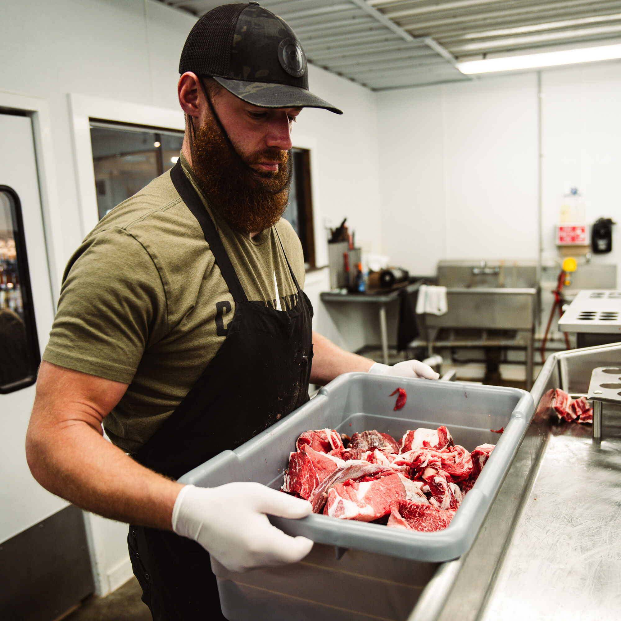 Scott holding a meat lug